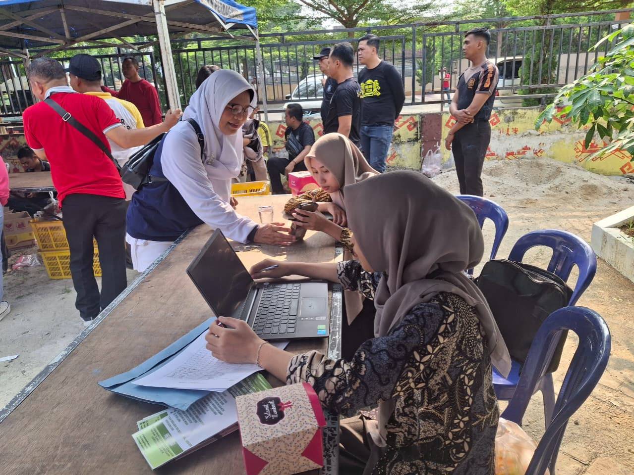 Dekatkan Layanan ke Masyarakat, Disdukcapil Metro Hadir di Harmoni Bazar dengan Jemput Bola Aktivasi IKD