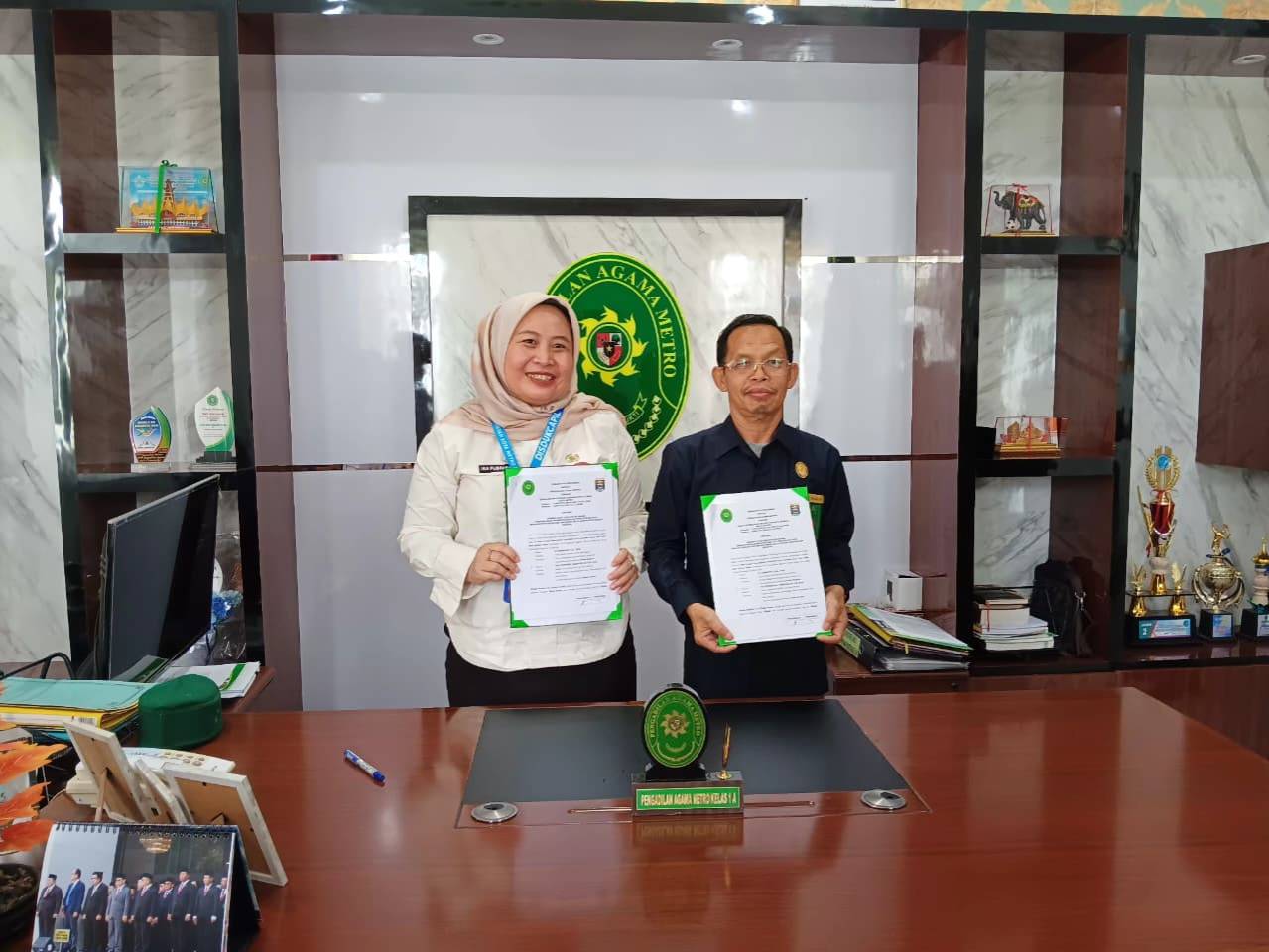 Penandatanganan PKS antara Disdukcapil dan Pengadilan Agama Metro Wujudkan Sinergi Data Melalui SIDORA