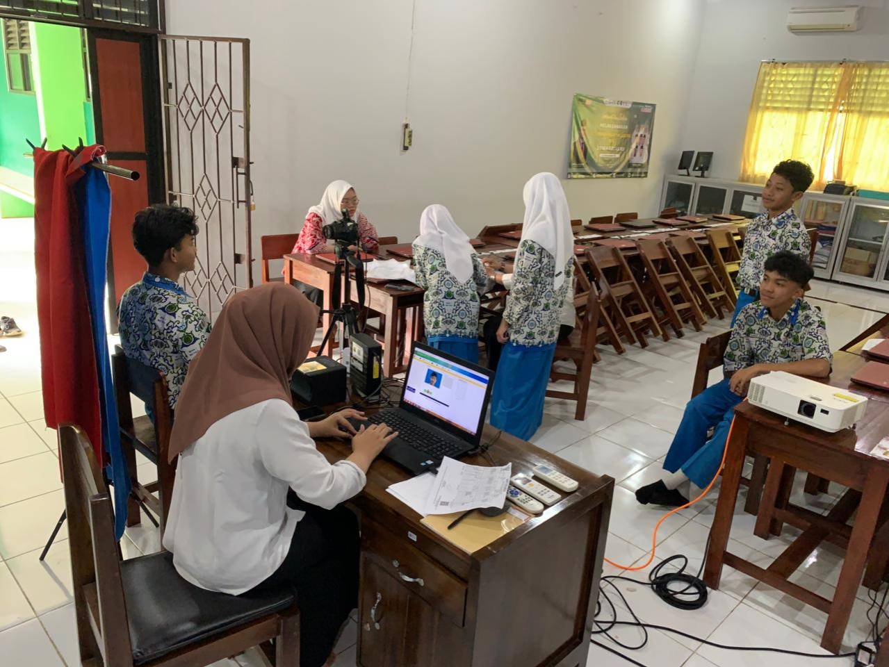 Disdukcapil Kota Metro Laksanakan Pelayanan Jemput Bola Perekaman KTP-el di MAN 1 Kota Metro