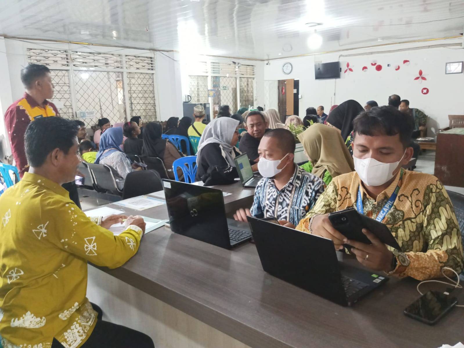 Sentuh Langsung Masyarakat Disdukcapil Metro Hadirkan Layanan Aktivasi IKD dalam Kegiatan Bantuan Atensi Anak